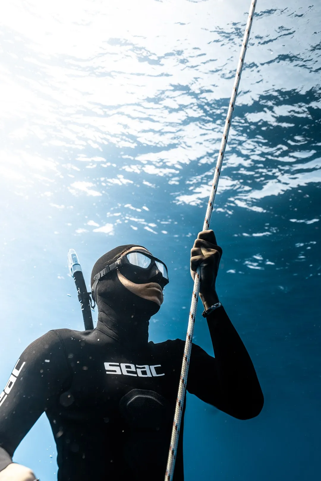 Freediving student and instructor in open water off Waikiki