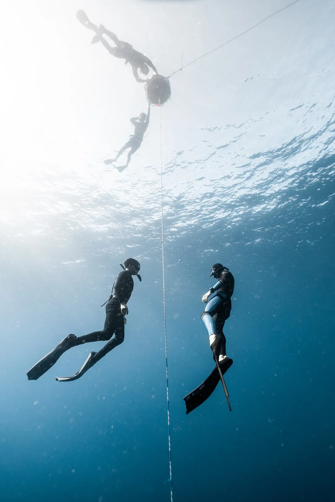 Beginner freediver in clear blue water during AIDA 1+2 open-water training