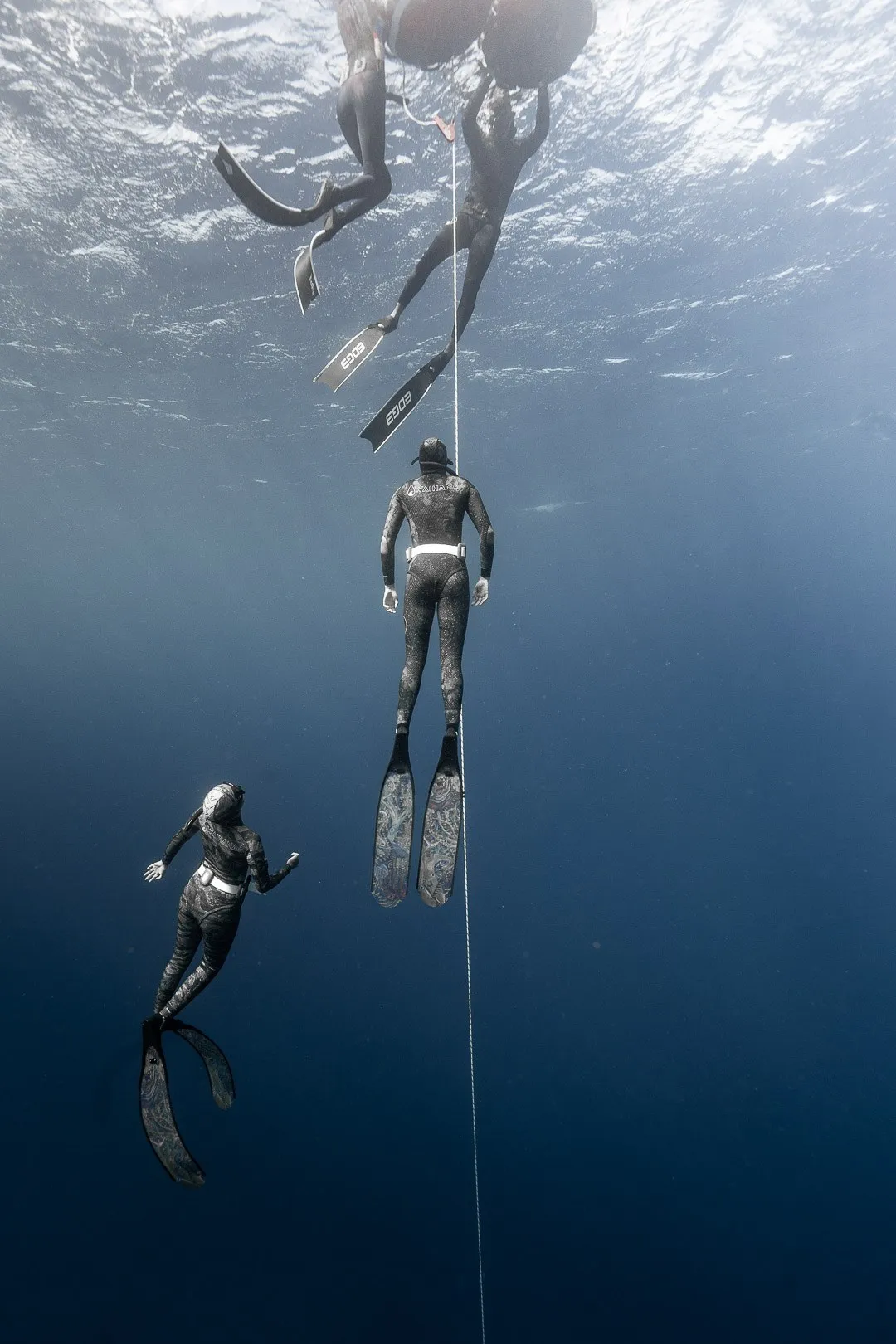 Freediver working on Frenzel equalization at depth during an AIDA 3 course