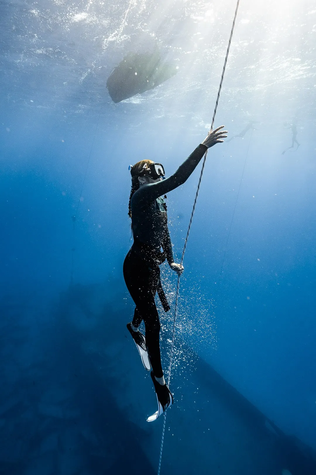 Freediver working on technique during a private training session in Waikiki